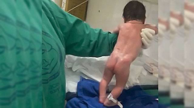 WATCH: Newborn Baby Attempts To Walk -- Yes, Seriously!