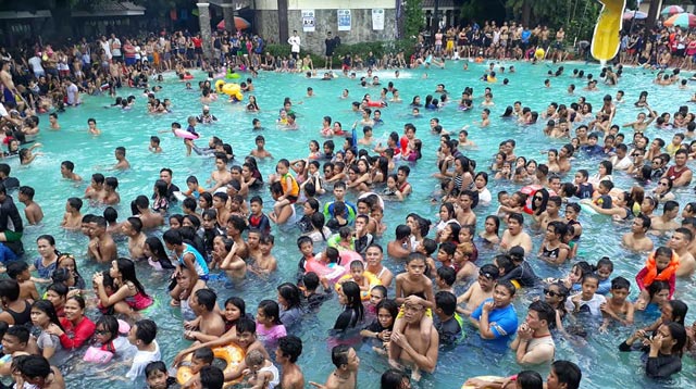 All the Illnesses and Diseases Your Child Can Get From Swimming in a Crowded Pool