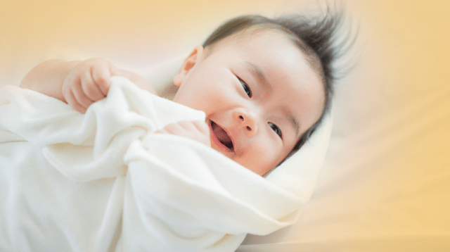 How Seeing Your Baby Smile Makes You Want To Care For Her More