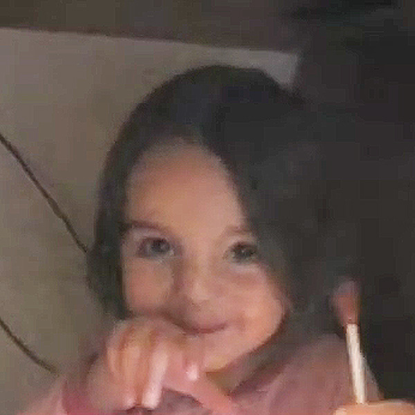 This Made Our Day: Cute Girl Tries to Hide Evidence She Had Too Many Candies