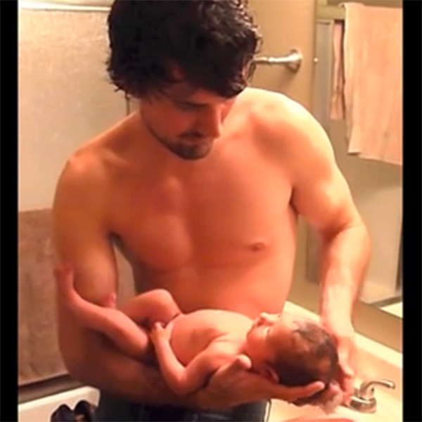 This Made our Day: Dad Lovingly Bathes His Newborn Daughter