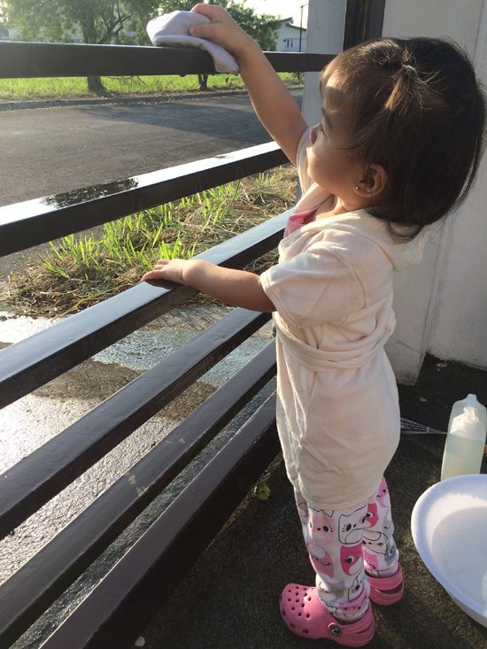 toddler doing chores