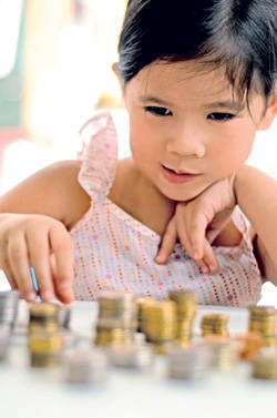 kid with coins