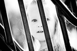 girl behind bars