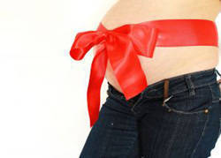 pregnant tummy with ribbon