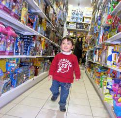 kid in toy store