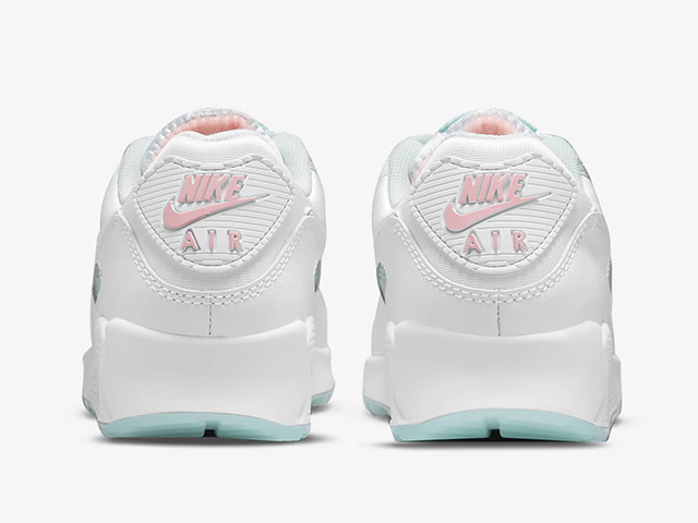 sleek white Nike Air Max 90 with pastel pink and blue accents
