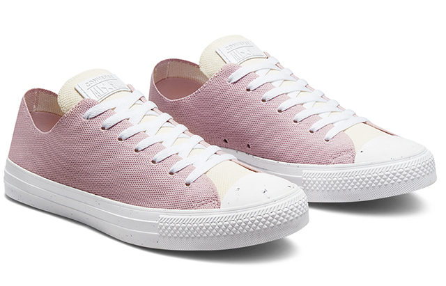 white sneakers with pink accents
