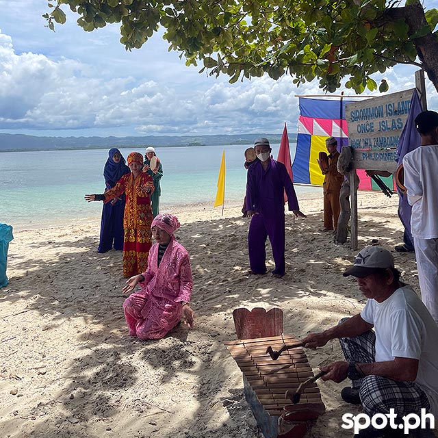Cultural dancers at the beachfront of Sirommon Island