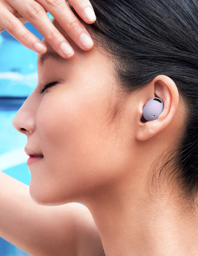 Side profile of woman wearing Samsung Galaxy Buds2 Pro in Bora Purple in left ear