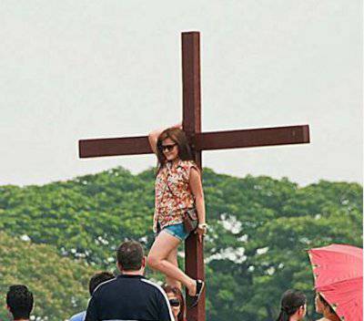 Photo Of Woman In Skimpy Shorts Parodying Jesus Christ S Cruxifixion Goes Viral Other Similar