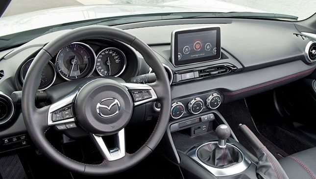 Does Mazda's built-in touchscreen violate the Anti-Distracted Driving law?