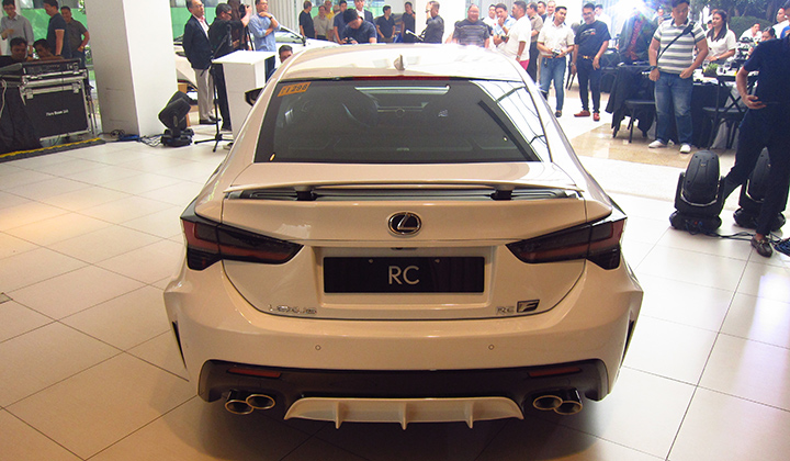 White Lexus RC F 2020 rear exterior with audience