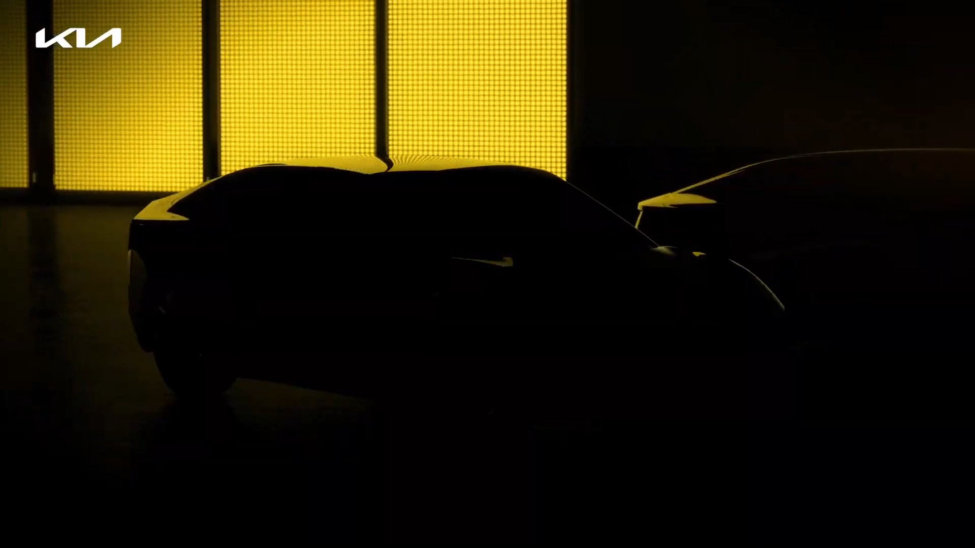 Kia Teaser Yellow Sedan