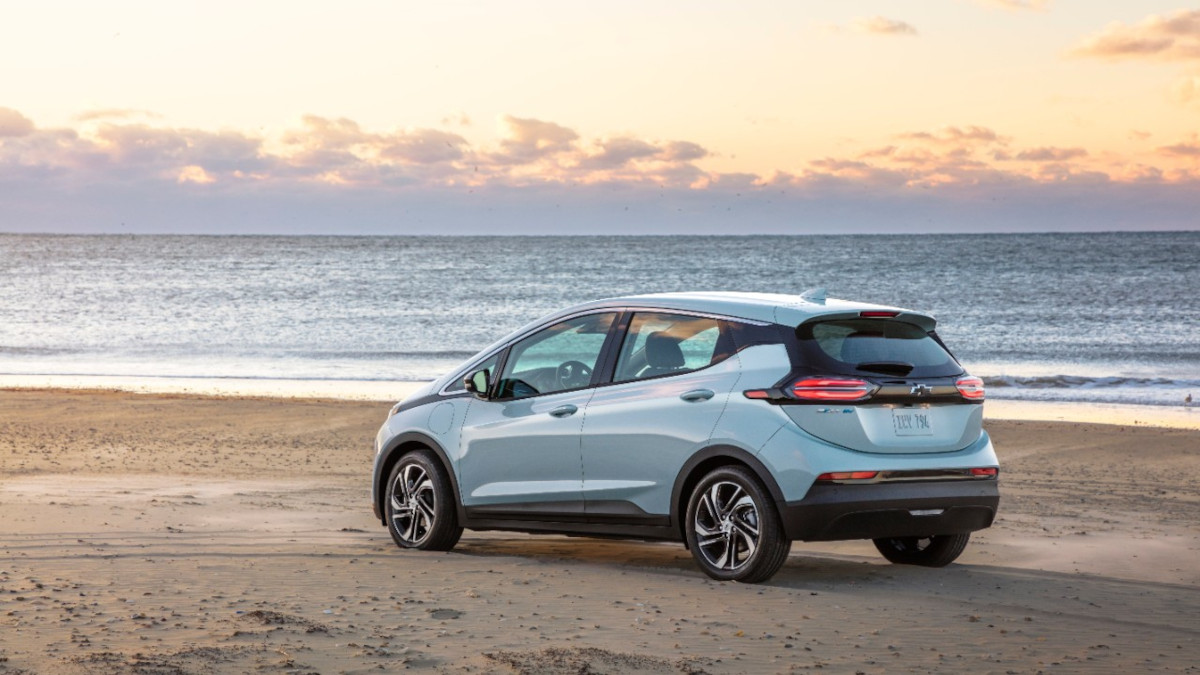 The Chevrolet Bolt rear view parked by the sea