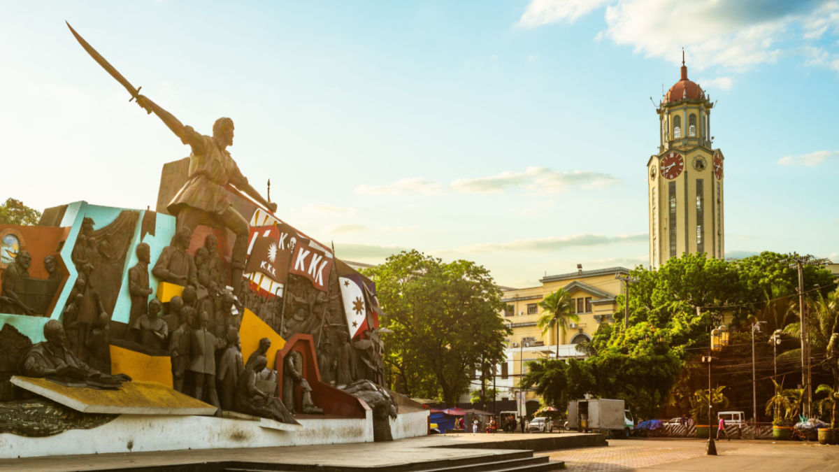 The Kartilya ng Katipunan Shrine and the Manila City Hall clock tower