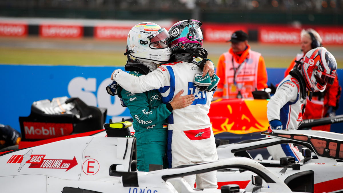Mick Schumacher and Sebastian Vettel celebrate Schumacher’s first Formula 1 points at the 2022 British Grand Prix