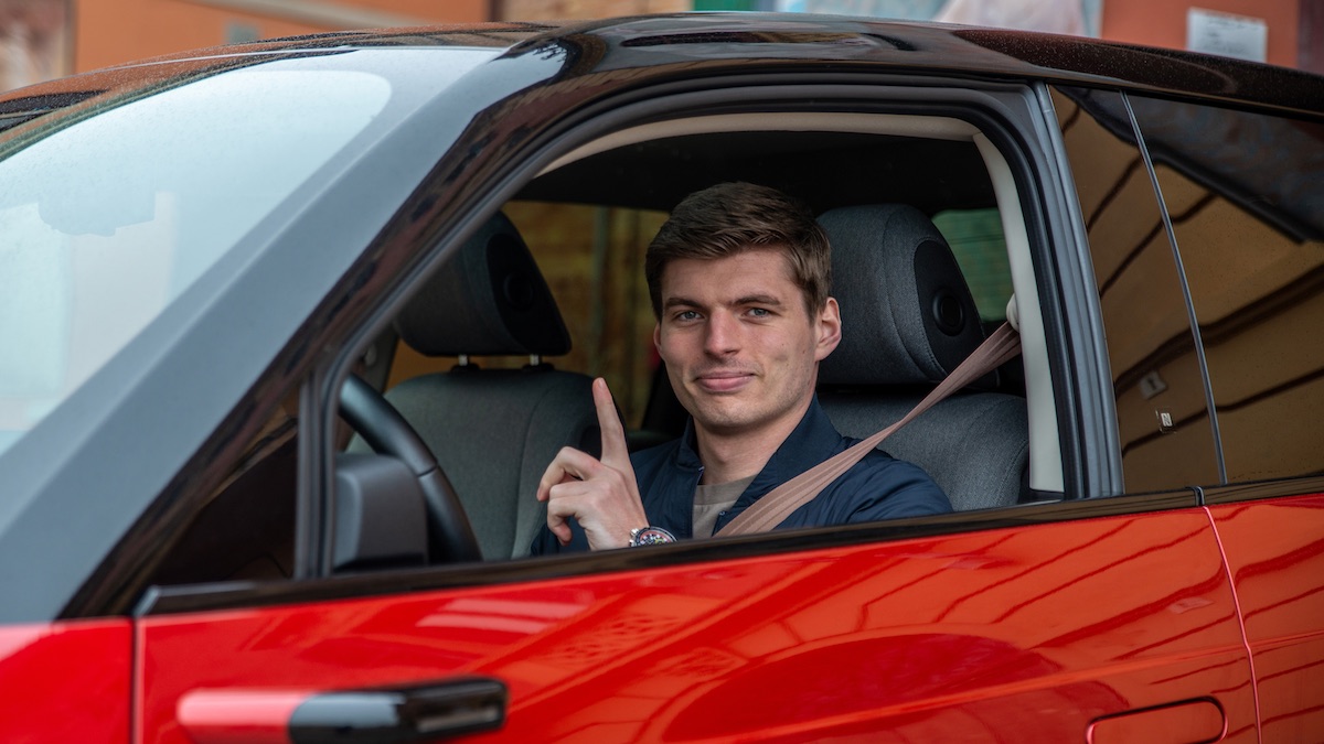 Formula 1 champion and Red Bull Racing driver Max Verstappen riding the 2022 Honda e Limited Edition
