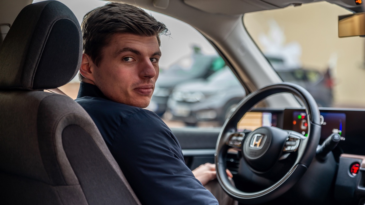 Formula 1 champion and Red Bull Racing driver Max Verstappen behind the wheel of the 2022 Honda e Limited Edition