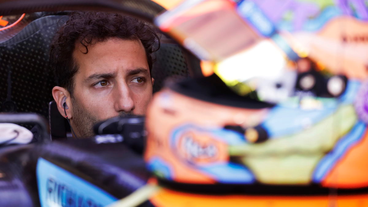 Racing driver Daniel Ricciardo in a Formula 1 car