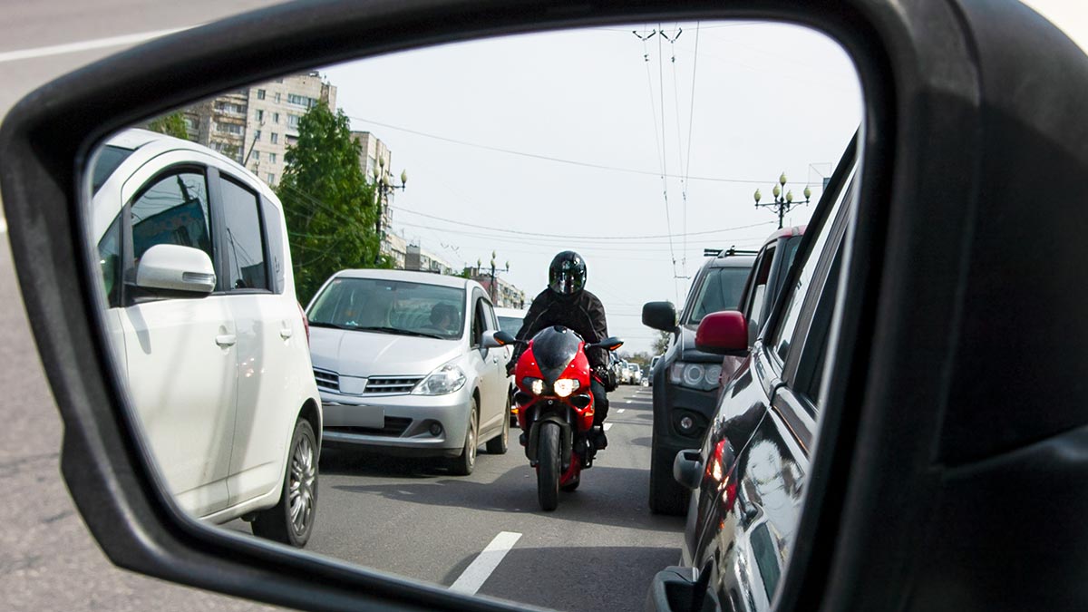 Motorcycle lane splitting on the highway