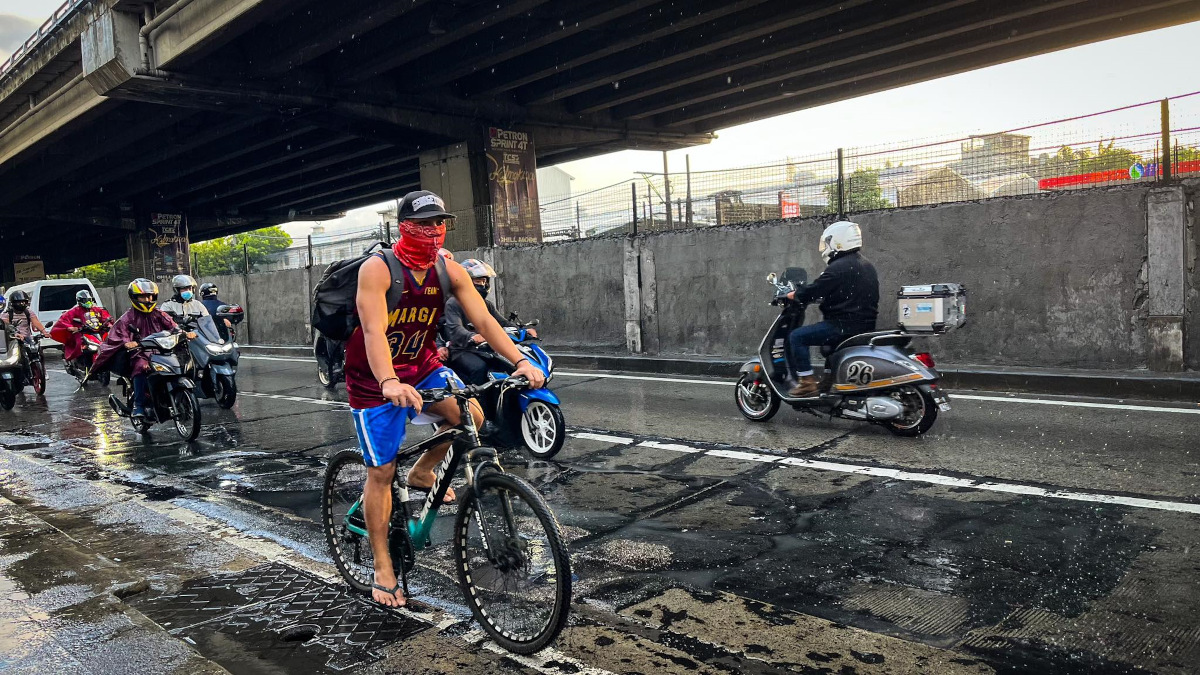 cyclist on the West Service Road in Metro Manila