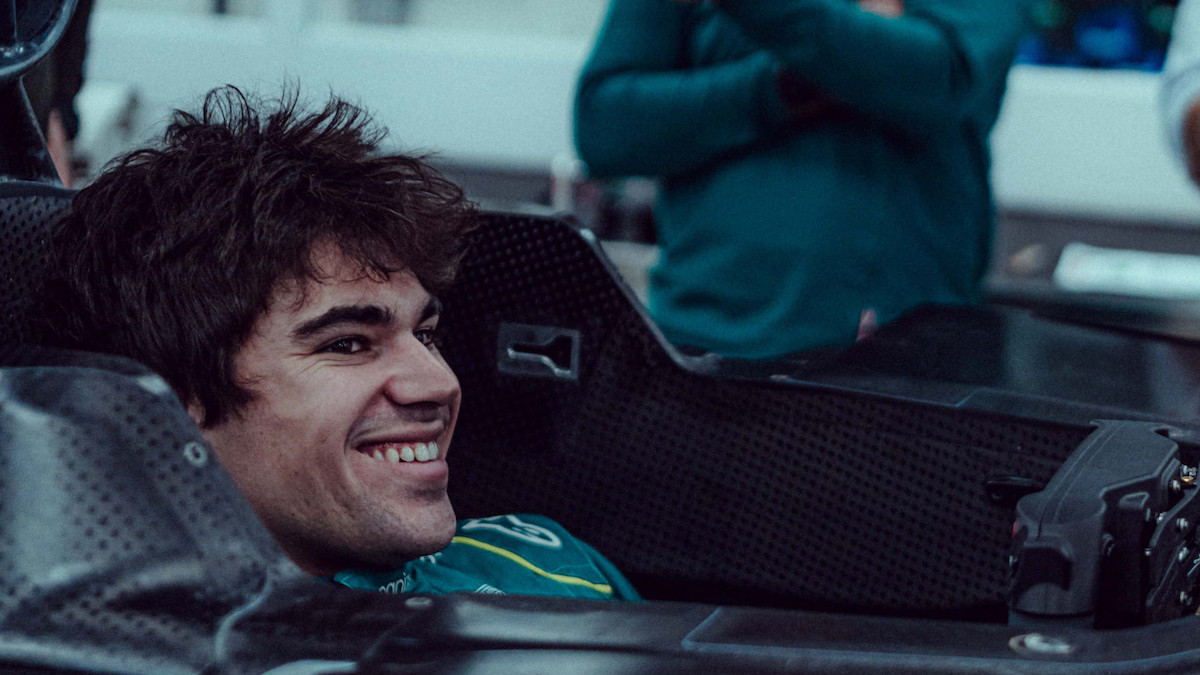Formula 1 driver Lance Stroll of Aston Martin being fitted for an F1 car seat