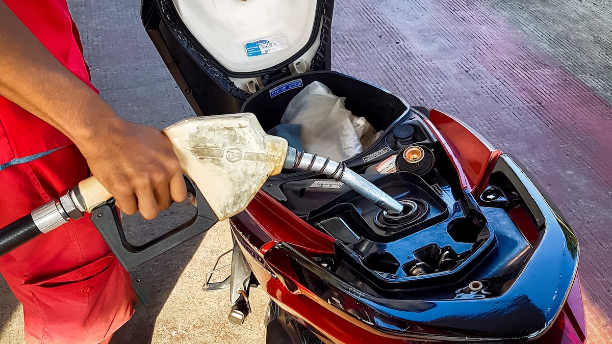 Image of a motorcycle being refueled