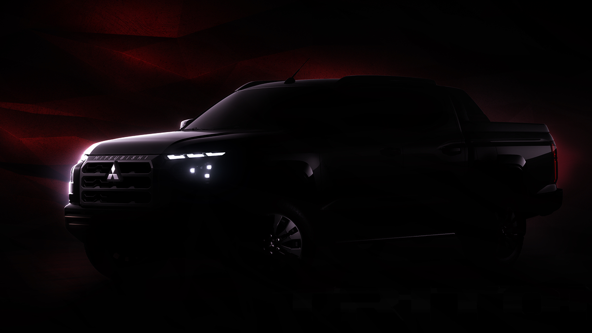 Front-quarter teaser image of the Mitsubishi Strada 2024