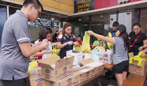 Top Gear readers, carmakers donate relief goods for flood victims