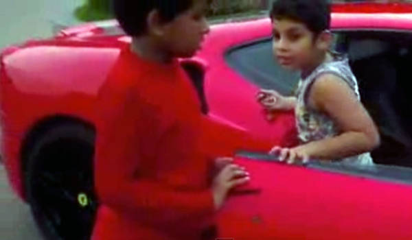 Small kid drives a Ferrari F430 in India