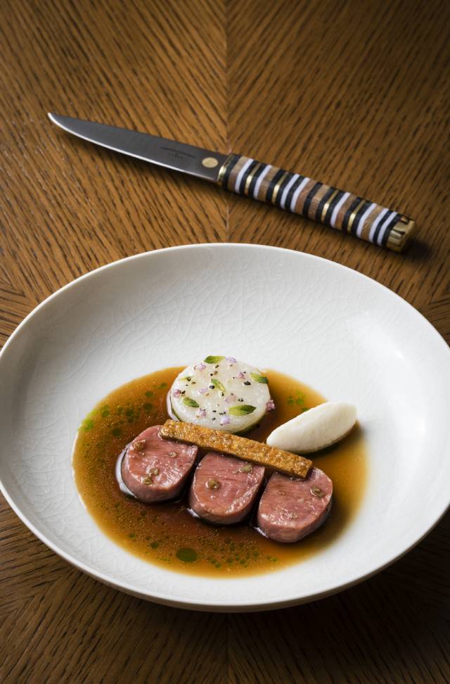 spring lamb loin, gunpowder, peppermint, and lamb fat photo