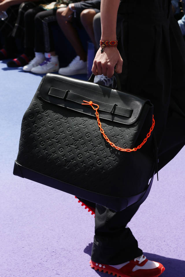 Louis Vuitton on X: #LVMenFW19 A neon interpretation of the classic # LouisVuitton Steamer bag. See more of @VirgilAbloh's latest show at    / X