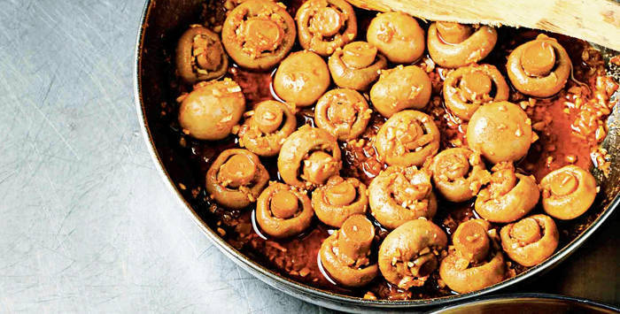 mushrooms in a pan sauteed in garlic 