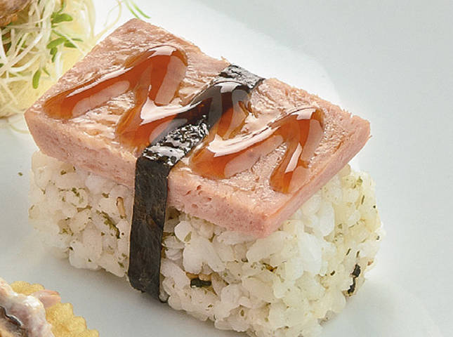 SPAM musubi or spam sushi topped with balsamic teriyaki sauce