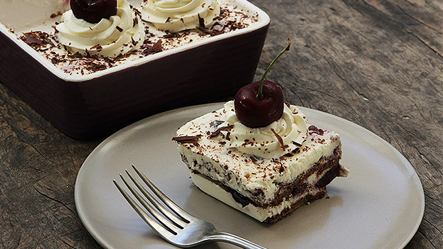 Black forest refrigerated graham cake recipe. A neat layer of chocolate grahams, whipped cream, cherries and shaved chocolate.