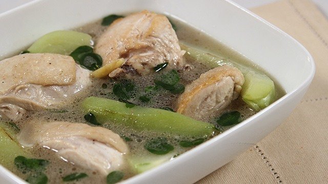 tinola soup with chicken pieces, green papaya or sayote, and malunggay leaves