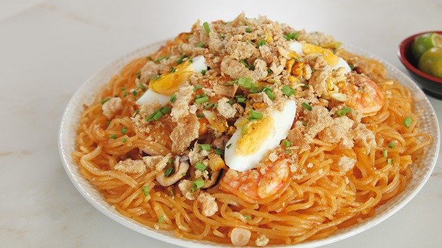 pancit palabok asian noodles with shrimp and ground pork sauce recipe image 