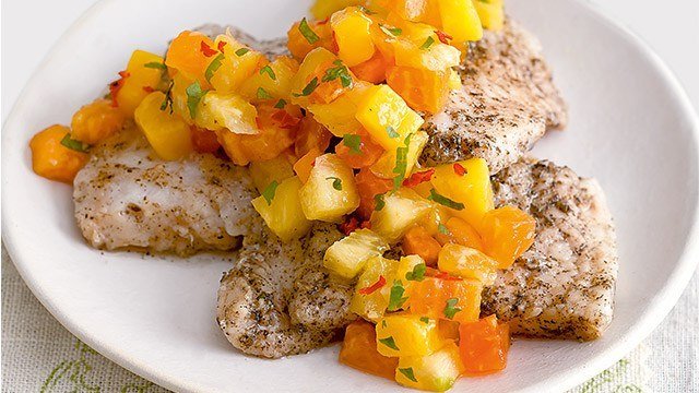 baked cream dory fillets topped with colorful mango, papaya, and pineapple salsa