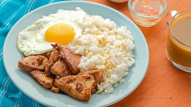 chicken tapa topped with fried egg