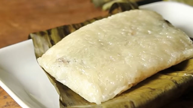 suman with banana leaves on a plate