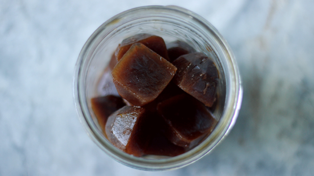 coffee frozen into ice cubes and served in a glass