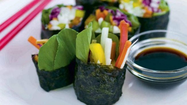 rainbow sushi filled with different colorful vegetables