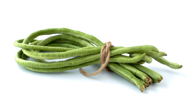 Sitaw, also known as asparagus or yardlong beans in other parts of the world, tied with a string.