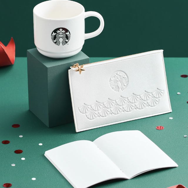 Starbucks drinkware and white pouch