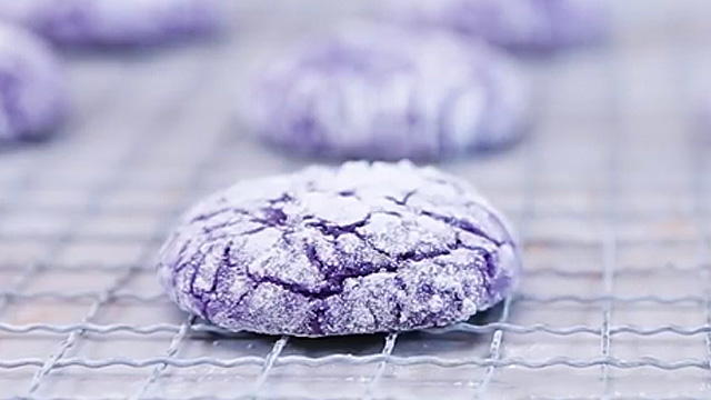 purple ube crinkles with real ube halaya or ube jam on cooling rack after baking