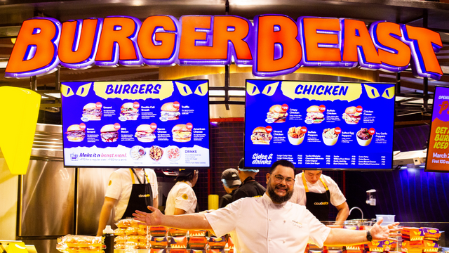 Chef Carlo Miguel in front of the newly-opened Burger Beast store in Uptown Mall.