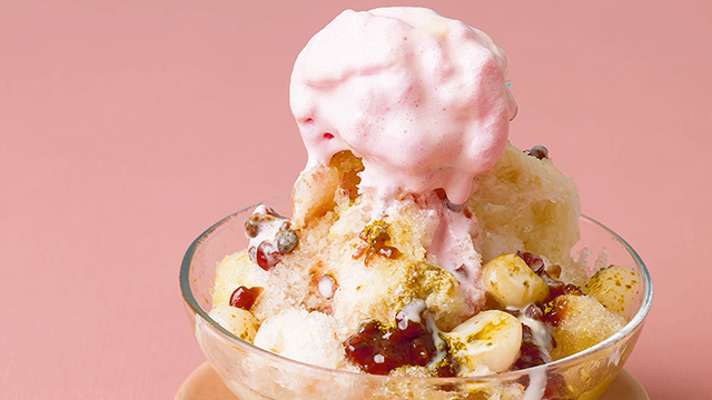 patbingsu topped with ice cream, pink background